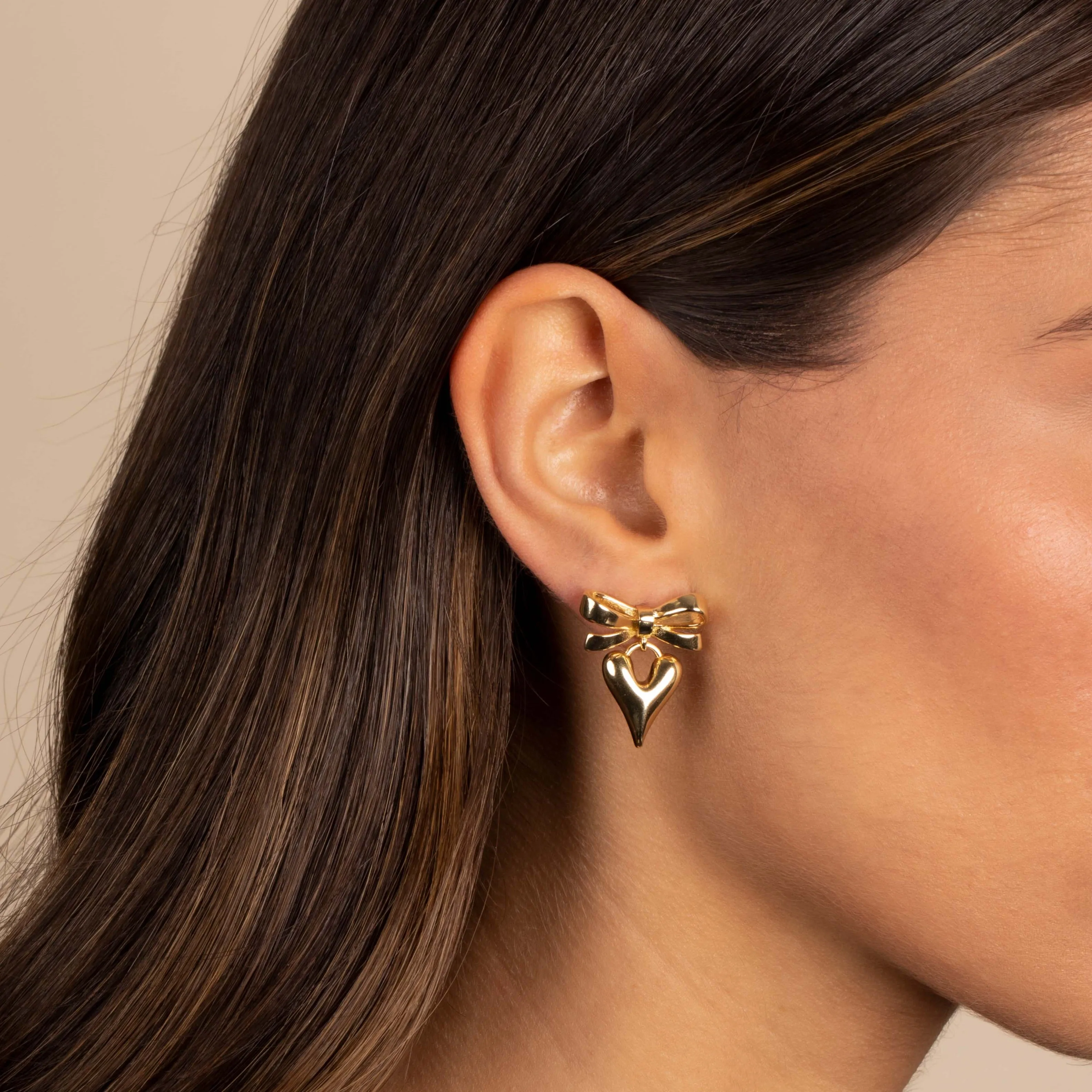 Bow Tie X Puffy Heart Drop Stud Earring