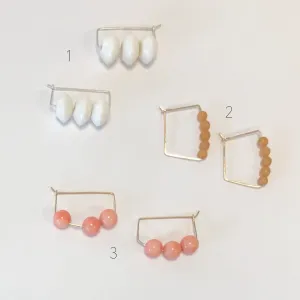 hoop earrings, Caitlin Clary