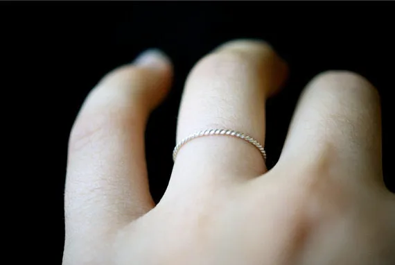 TWISTED THIN STACKING RING