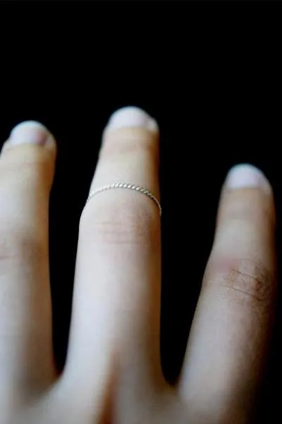 TWISTED THIN STACKING RING